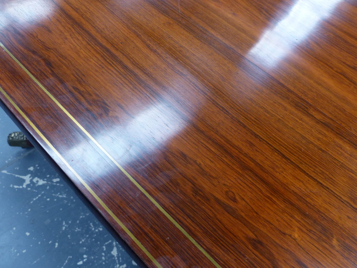 A REGENCY ROSEWOOD AND BRASS INLAID TILT TOP BREAKFAST TABLE ON QUADRUPED SABRE LEGS. 98 x 140 x H. - Image 7 of 14