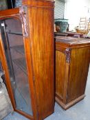 A VICTORIAN MAHOGANY BOOKCASE ON ENCLOSED CABINET BASE. W.96 x H.48cms.