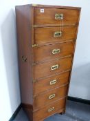 A 20th.C.MAHOGANY AND BRASS BOUND CAMPAIGN TYPE TALL CHEST OF SEVEN DRAWERS WITH SIDE CARRYING