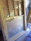 AN ANTIQUE ETCHED GLASS SASH WINDOW AND FRAME, VAULTS.