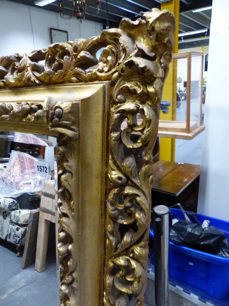 A BEVELLED GLASS RECTANGULAR MIRROR IN GILT GESSO PIERCED FOLIATE FRAME, OVERALL. 149 x 118cms. - Image 2 of 5