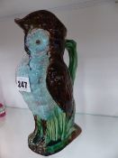 A PORCELAIN OWL JUG.