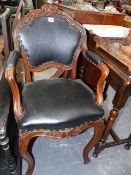 A VICTORIAN WALNUT SHOW FRAME ARMCHAIR.