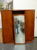 A LARGE ART DECO MIRROR DOOR WARDROBE.