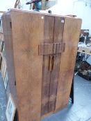 AN ART DECO SMALL WARDROBE.