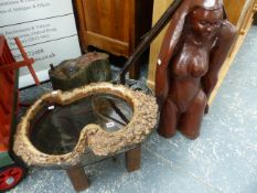 AN UNUSUAL BURR WOOD TOP COFFEE TABLE AND A CARVED WOOD FIGURE.