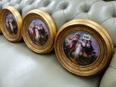 FOUR GILT FRAMED PLAQUES.