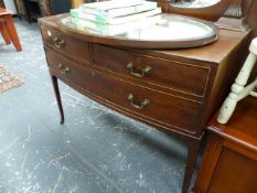 AN EDWARDIAN MAHOGANY BOW FRONT DRESSING TABLE.