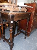 AN OAK OCCASIONAL TABLE.