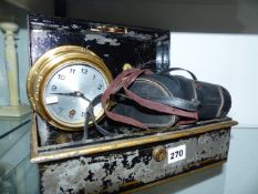 SHIPS CLOCK, PAIR OF BINOCULARS IN A VINTAGE TIN.