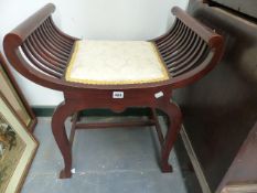 AN EDWARDIAN DRESSING STOOL.