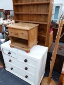 A PAINTED VICTORIAN CHEST OF DRAWERS, A TALL BOOKCASE AND A BEDSIDE CABINET.