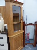 A BESPOKE OAK AND ELM CORNER CABINET.