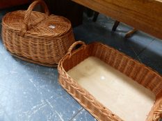 A PICNIC BASKET AND A BREAD BASKET.