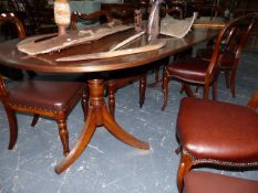 A REGENCY STYLE DINING TABLE.