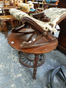 AN ARTS AND CRAFTS TABLE AND A GOUT STOOL.