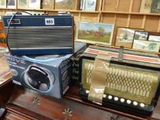 A ROBERTS RADIO, AN ACCORDIAN AND A CD PLAYER.