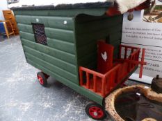 A CHICKEN COOP ON WHEELS.