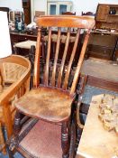 AN EDWARDIAN INLAID ARMCHAIR AND A VICTORIAN ROCKING CHAIR.