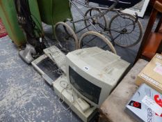 A VINTAGE AMSTRAD COMPUTER AND AN ANTIQUE HOOVER.