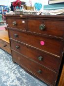 A VICTORIAN MAHOGANY CHEST OF DRAWERS.