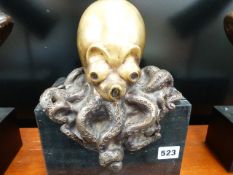 A BRONZE OCTOPUS ON SLATE BASE.