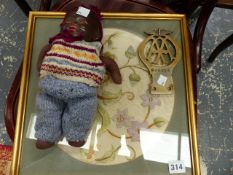 AN EARLY AA CAR BADGE, A SMALL DOLL AND AN EMBROIDERED PANEL.