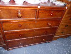 A VICTORIAN MAHOGANY CHEST OF DRAWERS.