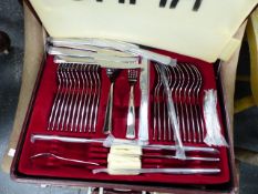 AN APPARENTLY UNUSED CUTLERY SERVICE.