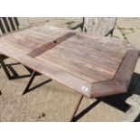 A TEAK PATIO TABLE.