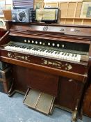 A LATE VICTORIAN CHICAGO COTTAGE ORGAN/HARMONIUM.