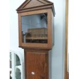 AN OAK LONG CASE CLOCK CASE.