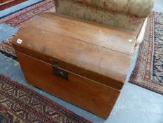 A VICTORIAN PINE DOME TOP TRUNK.