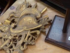 A GILT WALL APPLIQUE AND A HATSTAND.