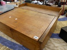 AN ANTIQUE PINE CLERK'S DESK.