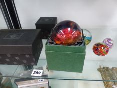 A QTY OF PAPERWEIGHTS.