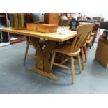 A BESPOKE OAK DINING TABLE.