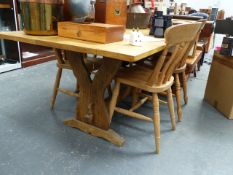 A BESPOKE OAK DINING TABLE.