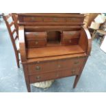 A WALNUT CYLINDER TOP BUREAU.