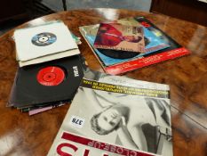 A QTY OF RECORD ALBUMS AND SINGLES.