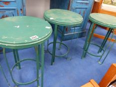 THREE PAINTED STEEL LOW STOOLS.