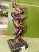 A BRONZE FIGURE THE WRESTLERS.