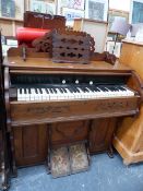 A KELLY ORGAN COMPANY HARMONIUM.