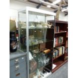 A GLAZED DISPLAY CABINET.