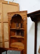 A PINE CORNER CABINET.