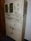 A VINTAGE KITCHEN CABINET.