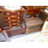 A MAHOGANY BEDSIDE CHEST, DOME TOP TRUNK, A LEATHER BOUND CHEST AND A LIFT TOP BOX.