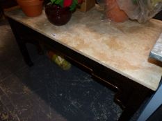 A MARBLE TOP COFFEE TABLE.