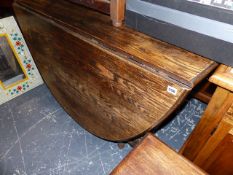 A LARGE OAK GATELEG TABLE.