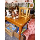 A SMALL PINE KITCHEN TABLE AND AN OCCASIONAL TABLE.
